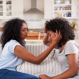 mom caring for teen girl