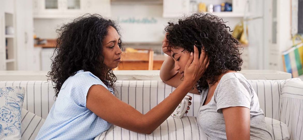 mom caring for teen girl